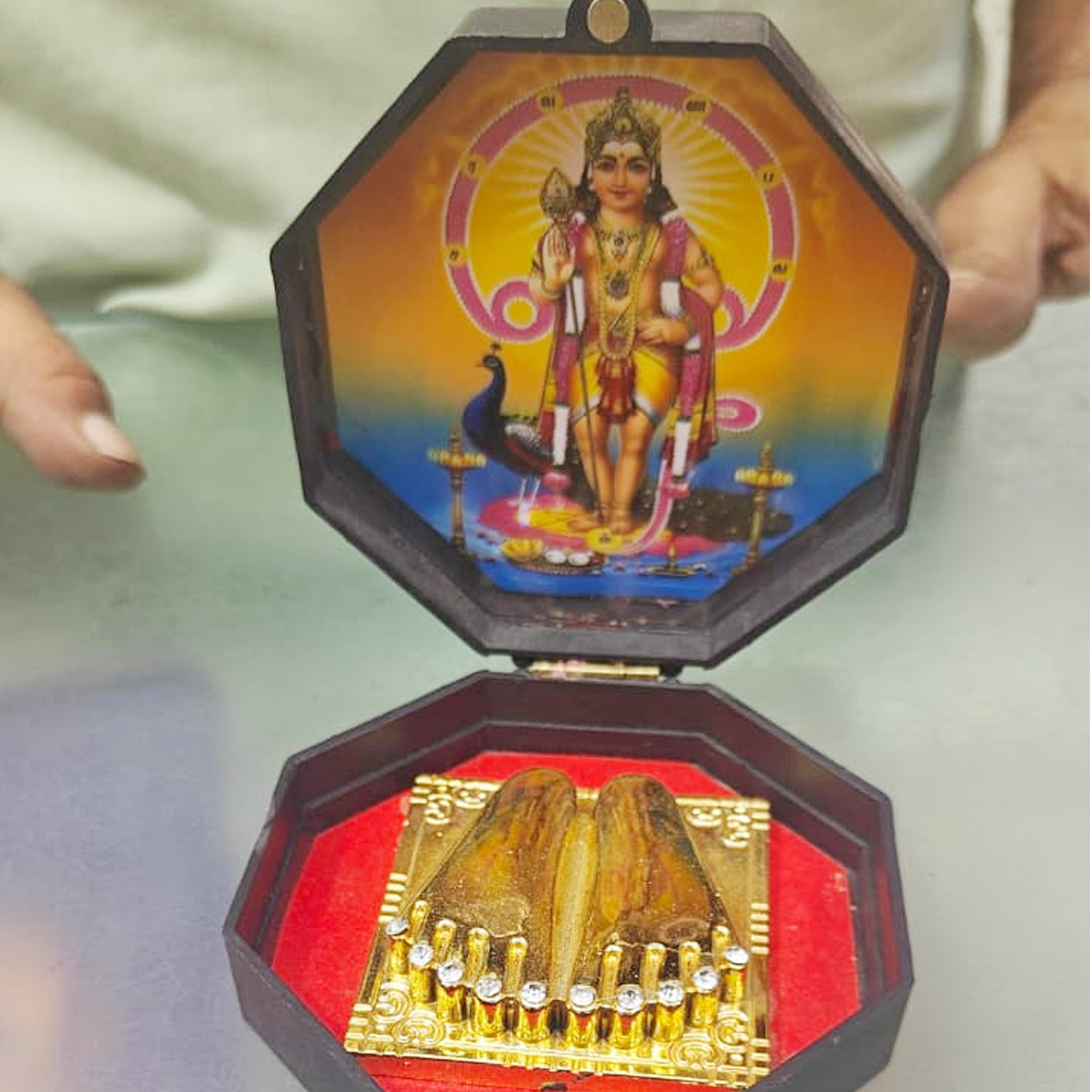 Lord Murugan divine feet (Padam) in a decorative pooja box